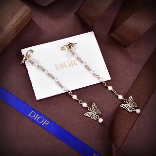Boucles d'oreilles Dior doré perle et papillon charme goutte