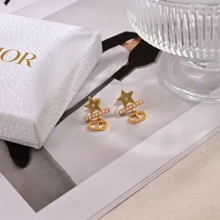 Dior Boucles d'oreilles motif étoile doré blanc
