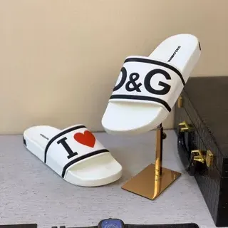 Dolce & Gabbana Chaussons blancs noirs imprimés logo bride semelle caoutchouc