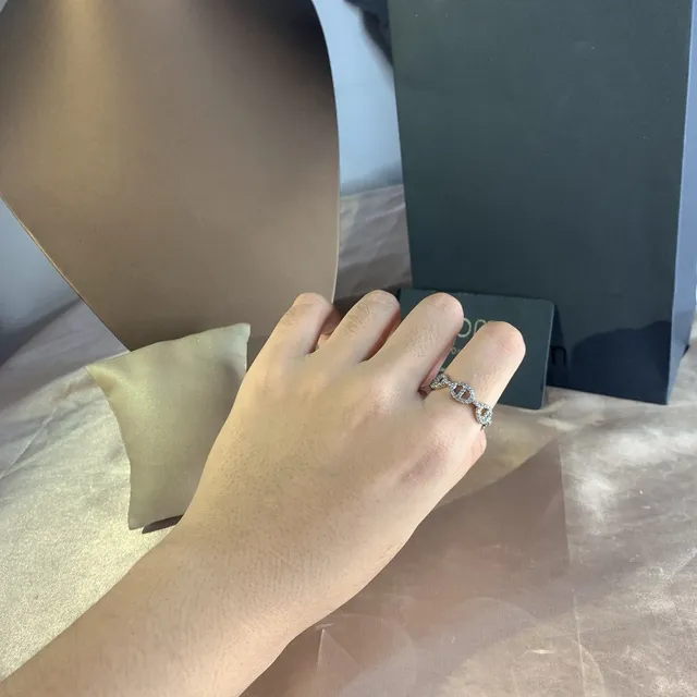 APM Monaco Interlocking Oval Pavé Ring 4