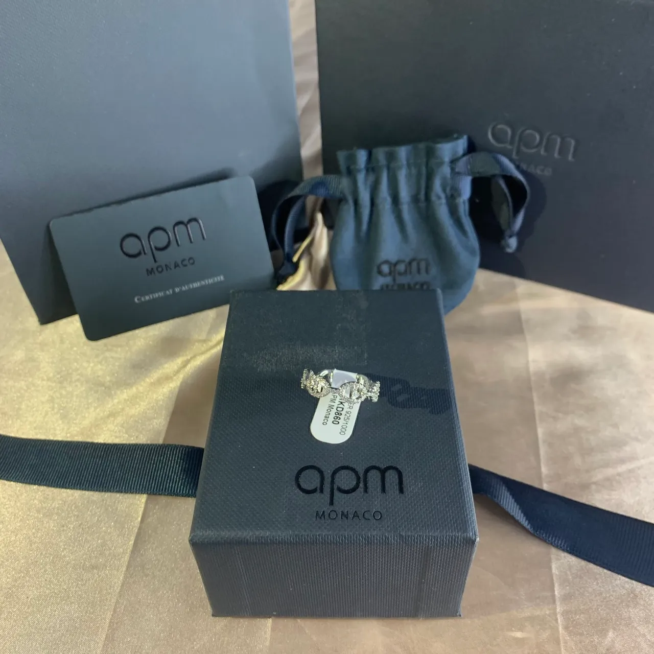 APM Monaco Interlocking Oval Pavé Ring 9