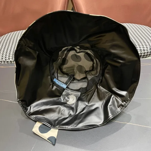 Chapéu bucket bege e preto com poá e laço na aba larga 11