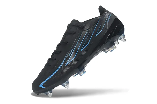 Chaussures de football de surface synthétique noire et bleue avec accents graphiques pour terrain ferme 3