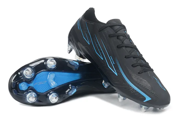 Chaussures de football de surface synthétique noire et bleue avec accents graphiques pour terrain ferme 4