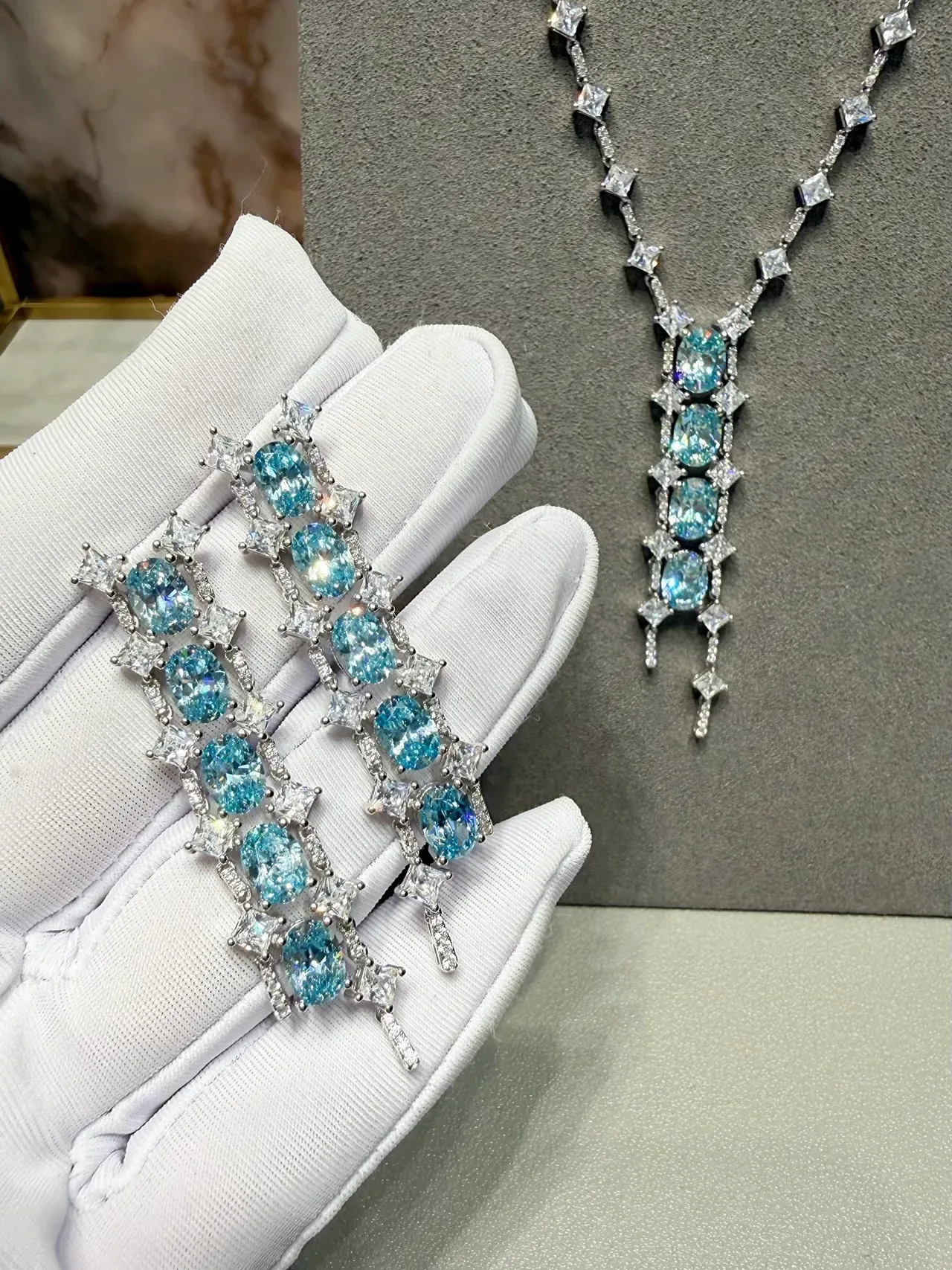 Cascading Oval Blue Gemstone and Clear Stone Drop Earrings 3