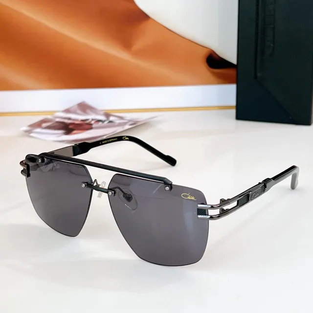 CAZAL gafas de sol negras bisagras doradas sin marco 8