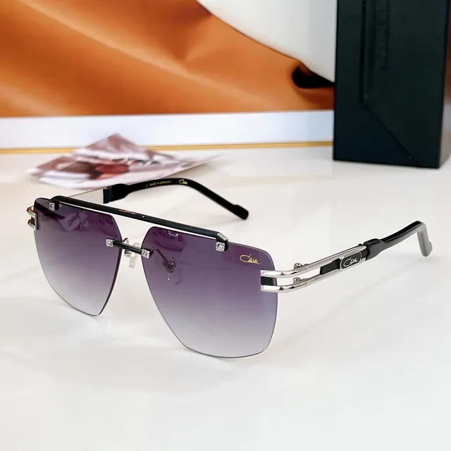 CAZAL gafas de sol negras bisagras doradas sin marco 9