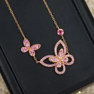 Collier papillon double pavé de gemmes roses en or rose