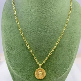 Collier médaillon circulaire doré