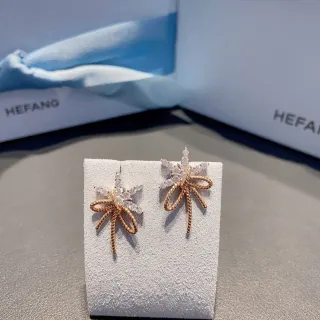 HEFANG أقراط أذن بتصميم قوس ونجمة كريستال بلون وردي ذهبي