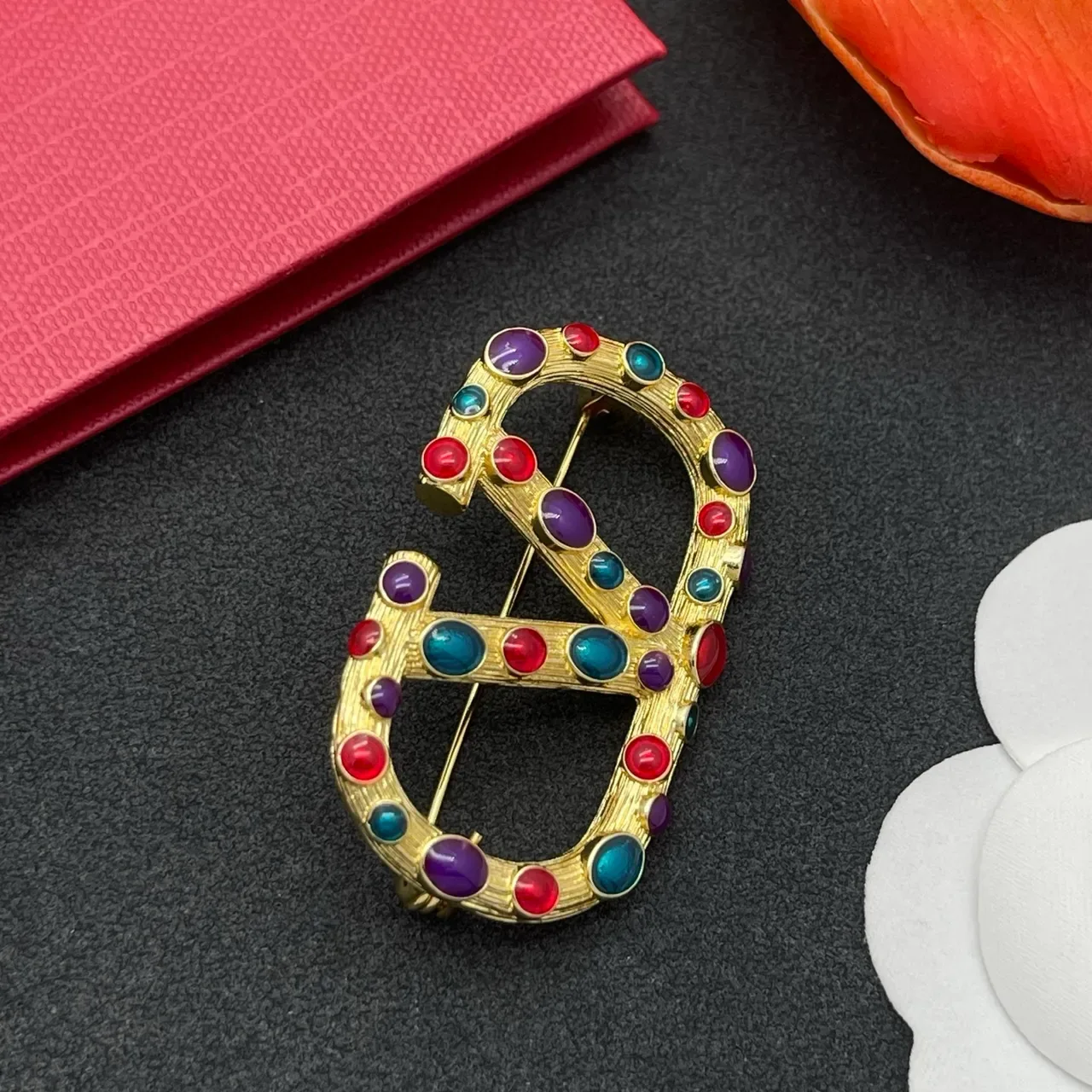 Multicolor Cabochon-Studded Interlocking C-D Motif Gold-Tone Brooch 6