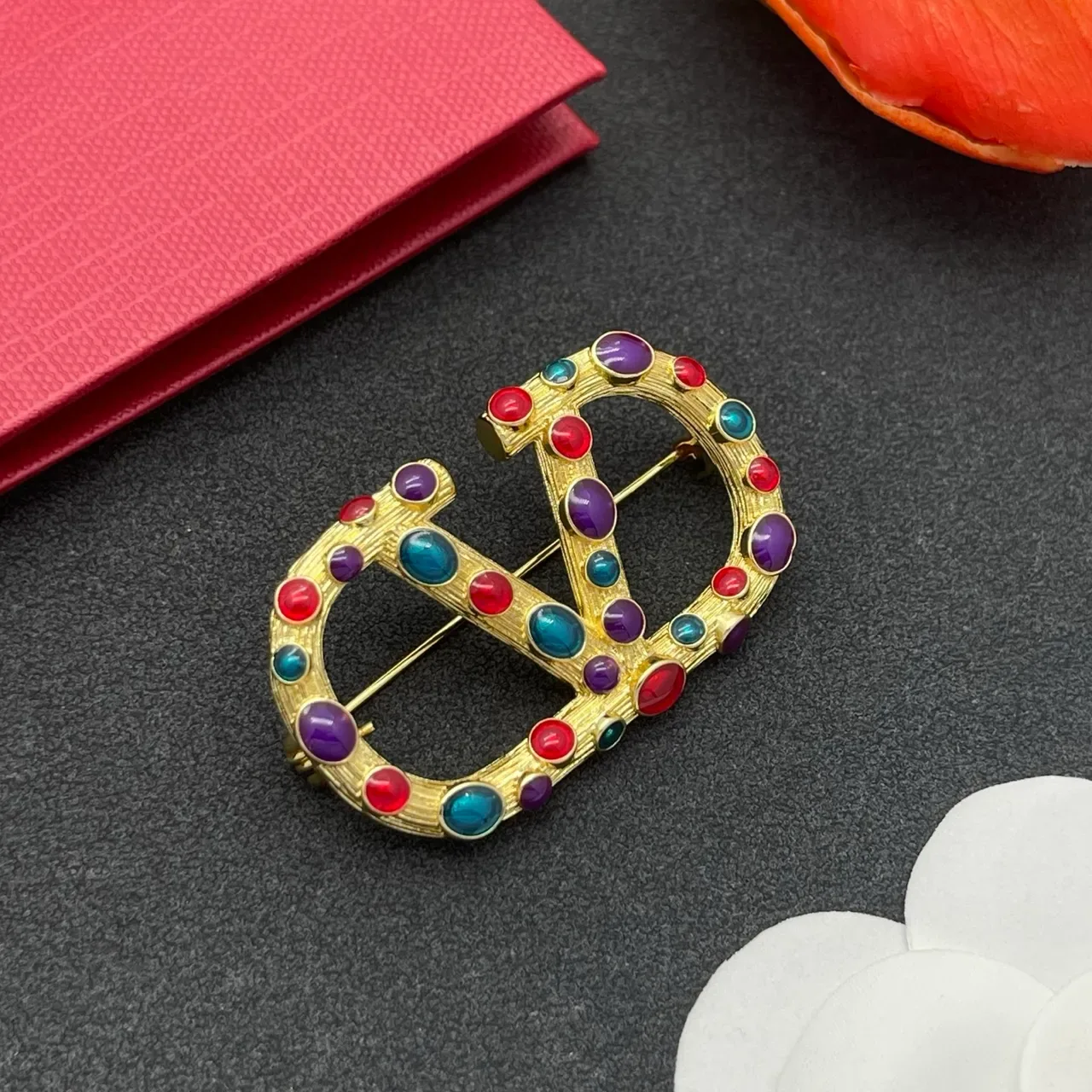 Multicolor Cabochon-Studded Interlocking C-D Motif Gold-Tone Brooch 7