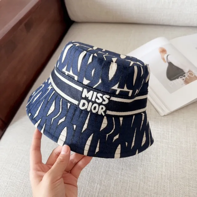 Sombrero bucket con estampado abstracto geométrico en azul marino y blanco 3