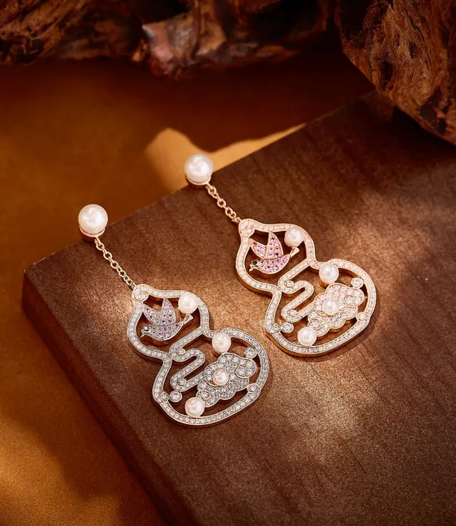 Aretes ornamentales de calabaza y pájaro con perlas y cristales 3