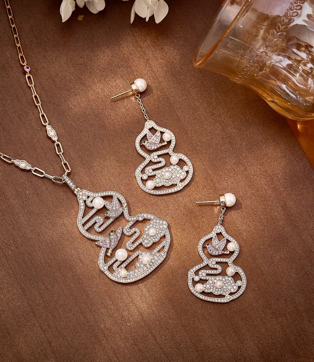 Aretes ornamentales de calabaza y pájaro con perlas y cristales 6