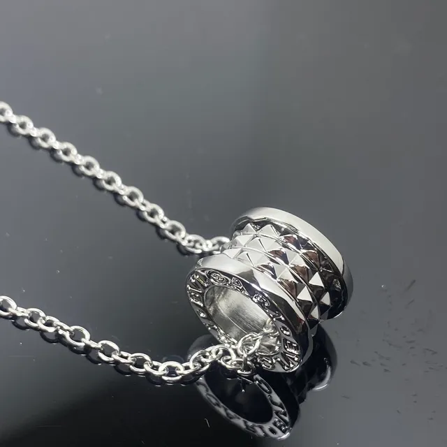 Polished Silver Cylindrical Faceted Pendant Necklace 2