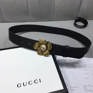 Gucci حزام جلدي أسود ذهبي بإبزيم زهوري وأجهزة