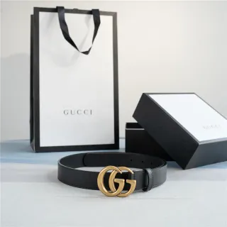 Gucci GG Marmont Noir et or Interlocking G Buckle Ceinture en cuir lisse