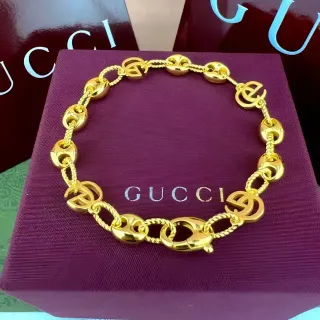 Gucci GG Marmont سوار ذهبي أنماط متشابكة سلاسل حبل ملتوية