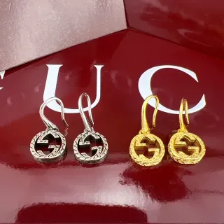 Gucci GG Marmont فضي وذهبي interlocking logo  ornate engraved border أقراط