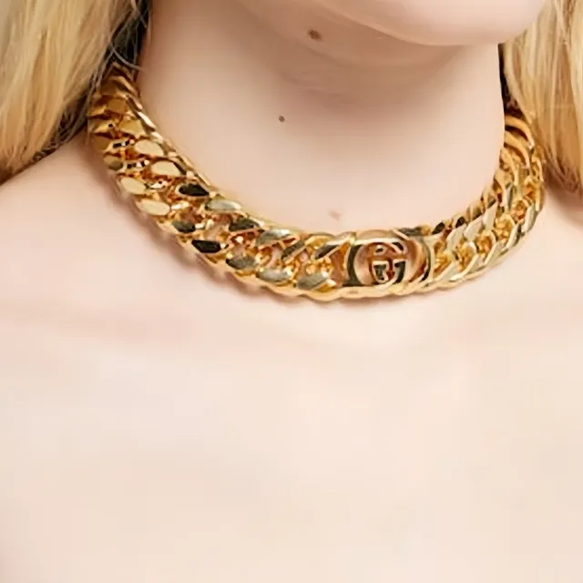 سوارة Gucci سلاسل كيرب-لينك ذهبية متشابكة قفل مزدوج-جي 2