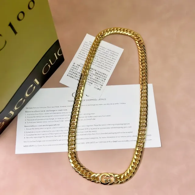 سوارة Gucci سلاسل كيرب-لينك ذهبية متشابكة قفل مزدوج-جي 5