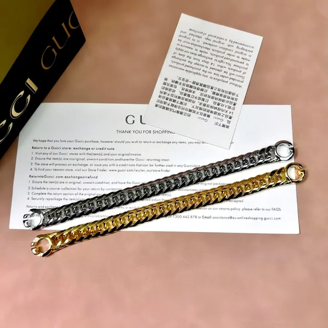سوارة Gucci سلاسل كيرب-لينك ذهبية متشابكة قفل مزدوج-جي 6