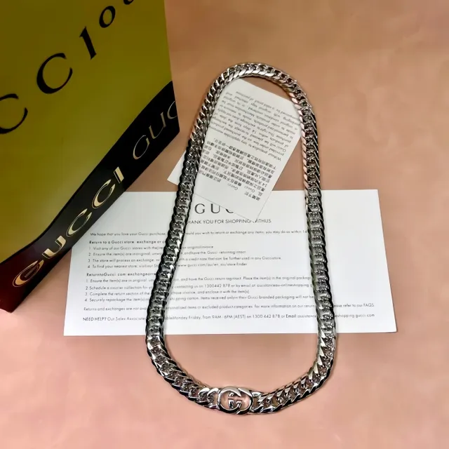 سوارة Gucci سلاسل كيرب-لينك ذهبية متشابكة قفل مزدوج-جي 7