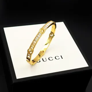 Gucci سوار بنجل ذهبي اللون كريستال باغيت إنترلوكينج جي
