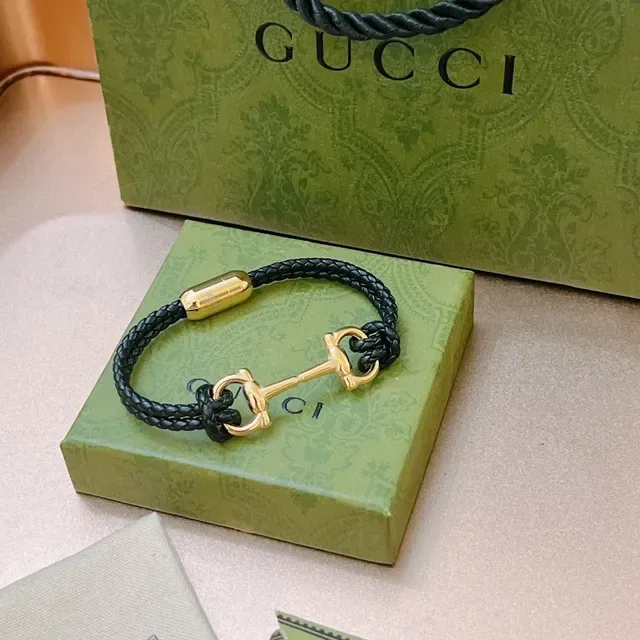 Pulseira Gucci Horsebit 1955 de couro trançado preto e dourado 5