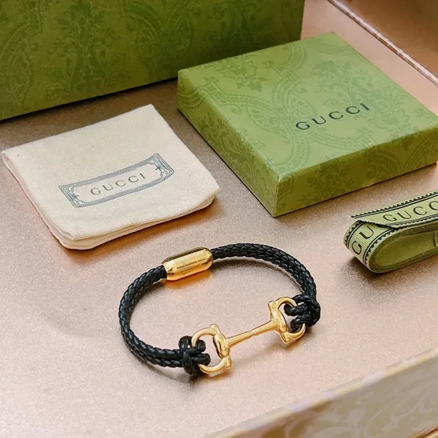 Pulseira Gucci Horsebit 1955 de couro trançado preto e dourado 8