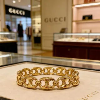 Gucci Horsebit 1955 سوار ذهبي اللون مع ربط متشابك