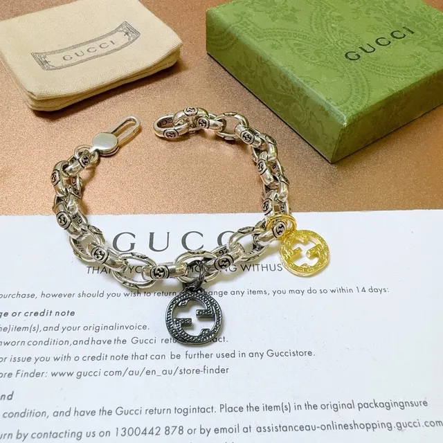 Gucci Interlocking G Motif चेन ब्रेसलेट सिल्वर गोल्ड मोटा ओवल-लिंक ब्रेसलेट 4