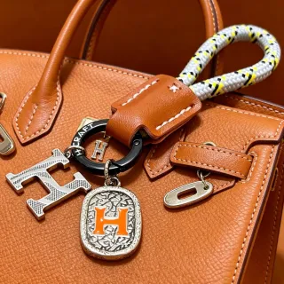 Hermès भूरा नारंगी संरचित चमड़े का सैटल टॉप-हैंडल हैंडबैग