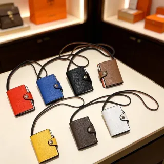 Hermès Multicolor Pebbled Leather Snap-Button Strap Closure Card Holder