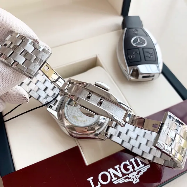 Longines Reloj mecánico con esfera de acero inoxidable plateada blanca 2
