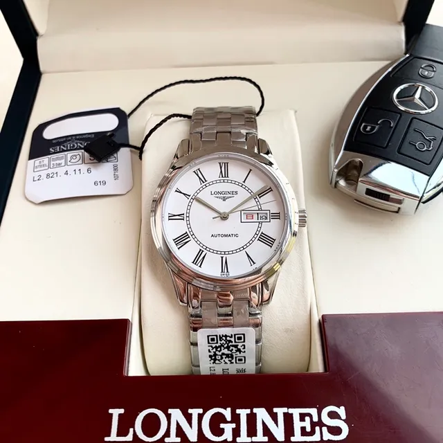 Longines Reloj mecánico con esfera de acero inoxidable plateada blanca 9