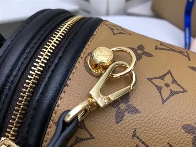 Louis Vuitton Sac seau beige noir structure rigide cylindrique toile monogram 5