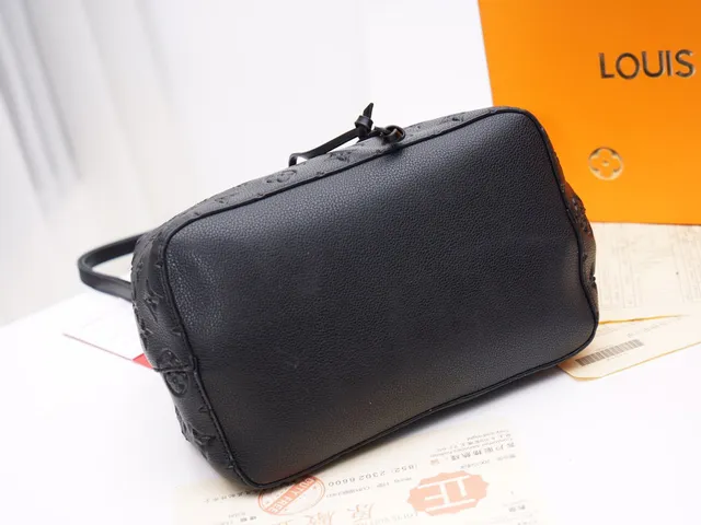 Louis Vuitton Black Gold Embossed Monogram Leather Drawstring Closure Bucket Bag 23