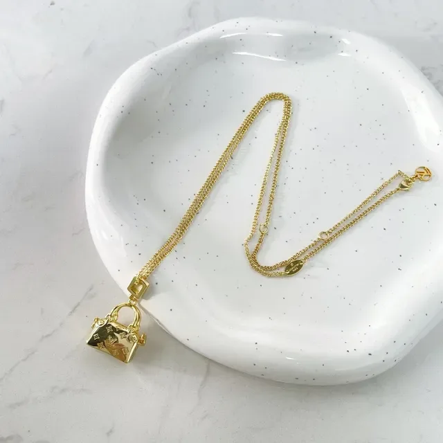 Collar Louis Vuitton Dourado Monogramado 4