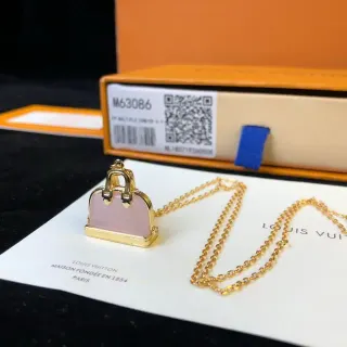 Louis Vuitton Collier Pendentif Sac Doré et Rose en Métal