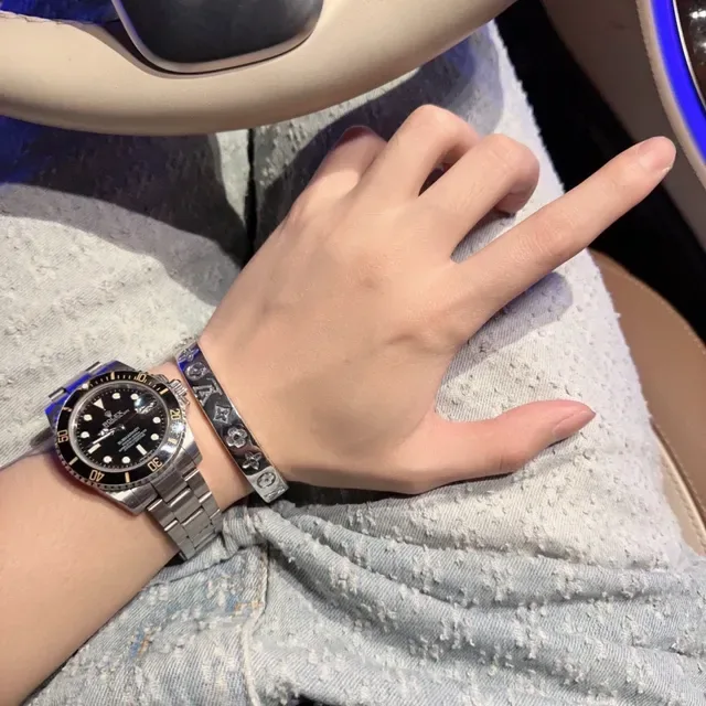 Louis Vuitton Monogram Flower Engraved Silver-Tone Bracelet 4