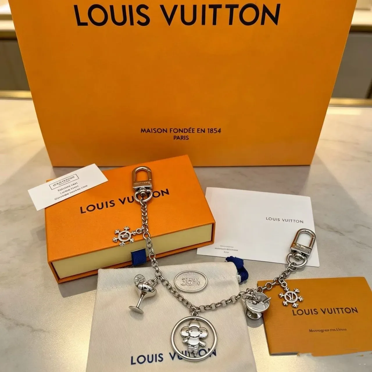Louis Vuitton मल्टी-चार्म गोल्ड सिल्वर डुअल-टोन मेटल ब्रेसलेट 2