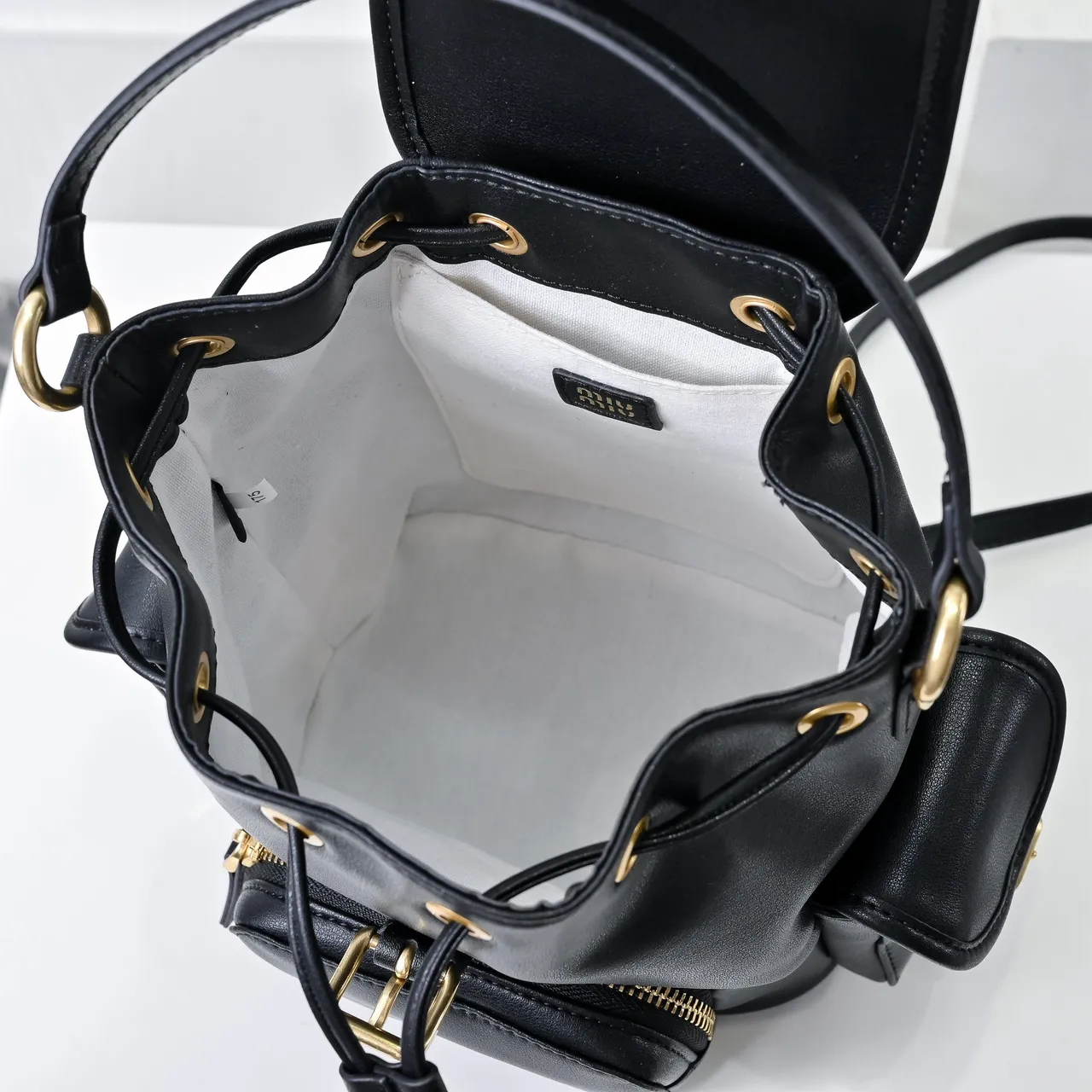 Miu Miu Black Gold Structured Leather Drawstring Cinch Closure Mini Backpack 3