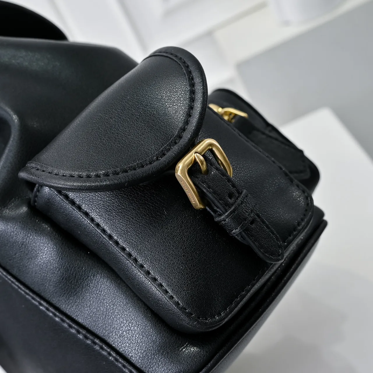 Miu Miu Black Gold Structured Leather Drawstring Cinch Closure Mini Backpack 4