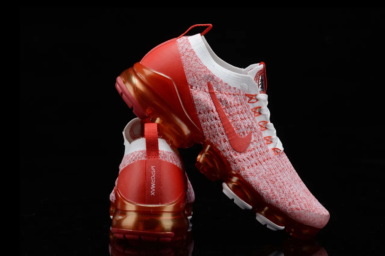 Nike Air VaporMax Chaussures de course orange et blanc 10