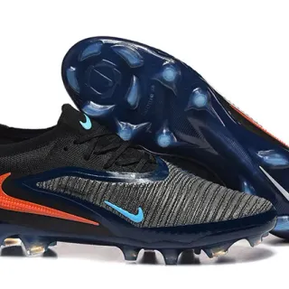 Nike Chaussures de football noir marine de coupe basse avec upper en maille et lacets asymétriques pour terrain ferme