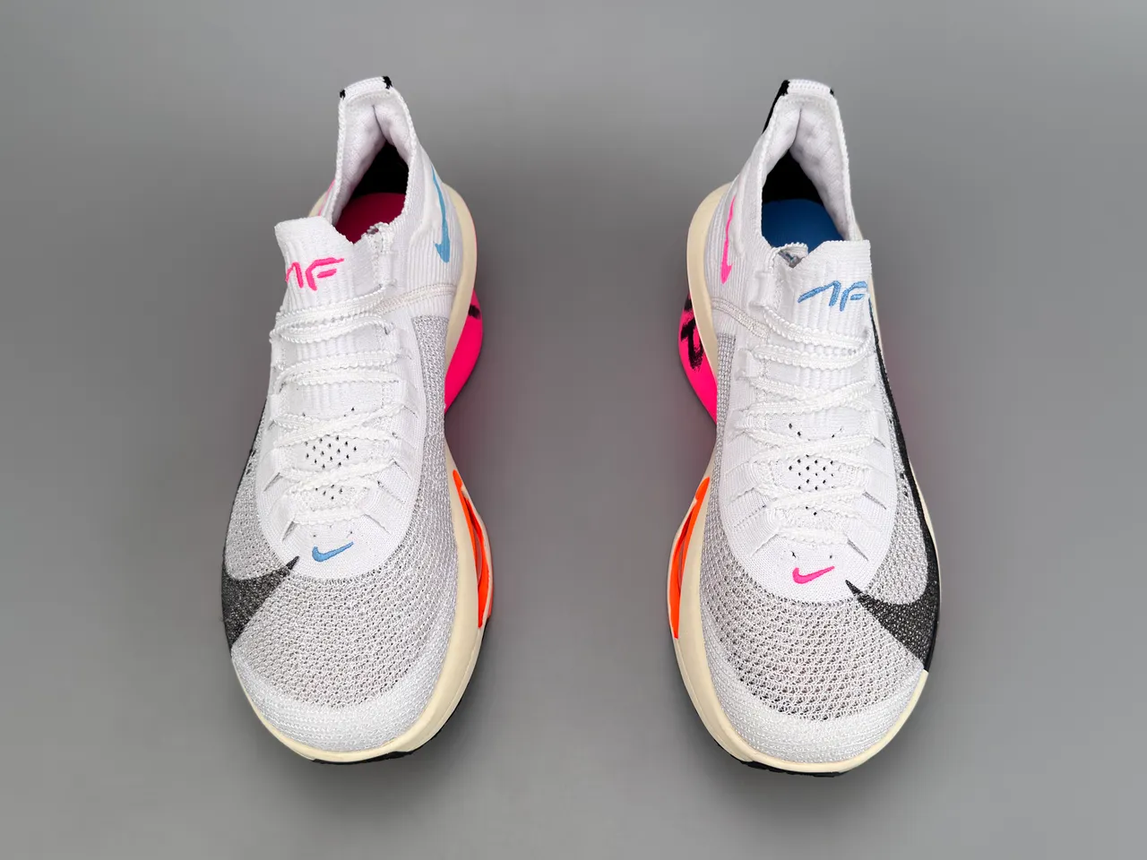 Nike chaussures de course blanc rose avec tige en maille Air Zoom Forefoot Unit 9