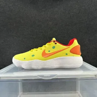 Nike أصفر برتقالي بولكا دوت ميد سول مضلع أسلوب حياة حذاء سنيكر