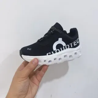On Cloudmonster Off-White and Black Lifestyle Sneakers 3